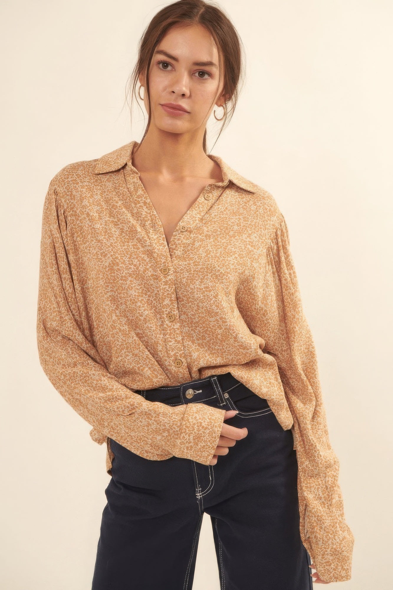 Model wearing golden floral print button-up blouse with relaxed fit, front view-AVAH