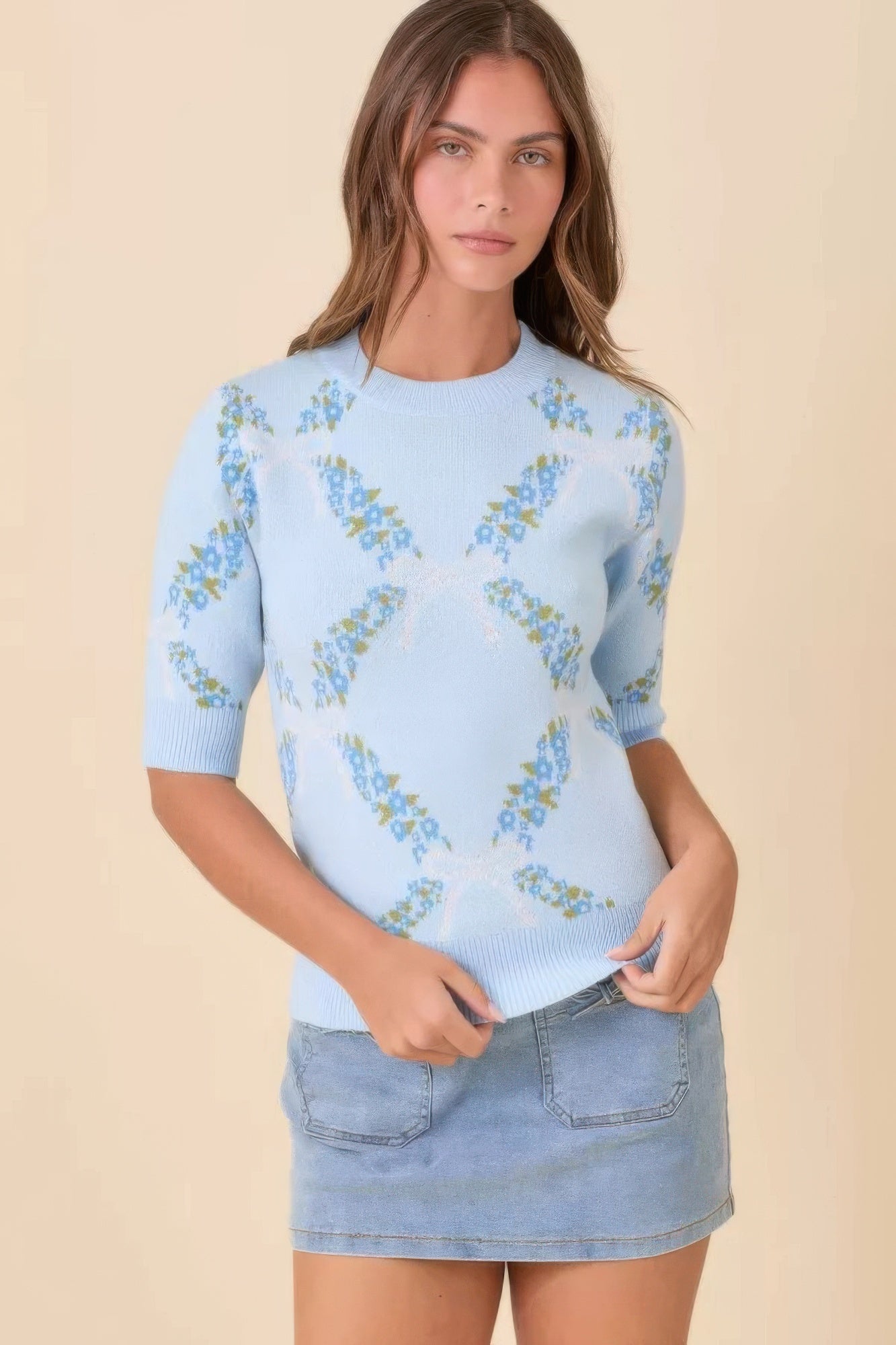 Model wearing light blue floral-pattern short sleeve knit sweater, front view-AVAH