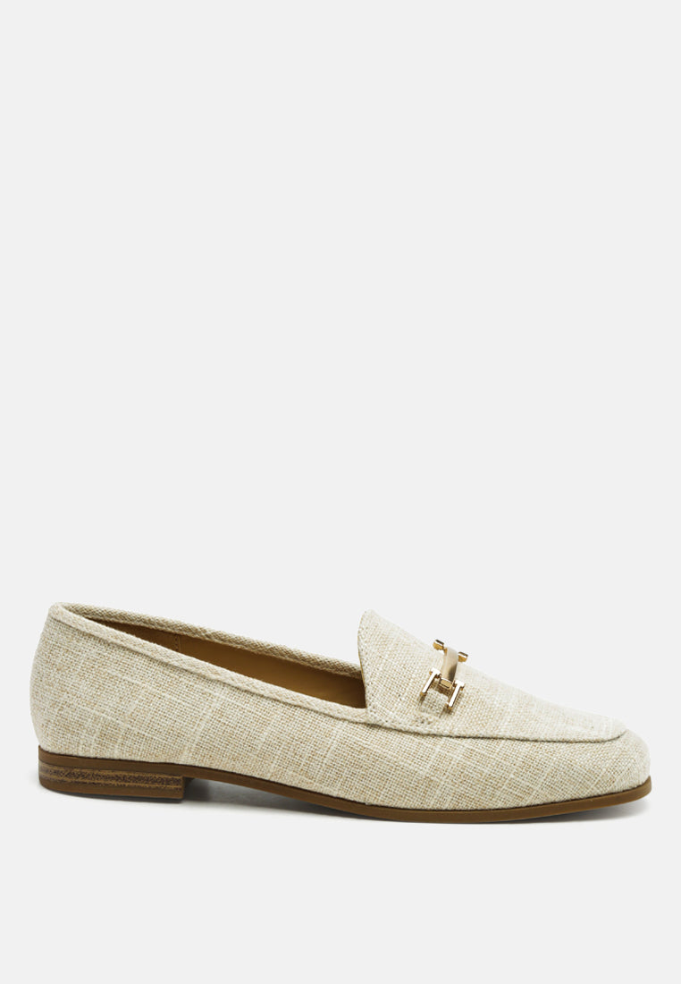 Beige loafer shoe on a white background
