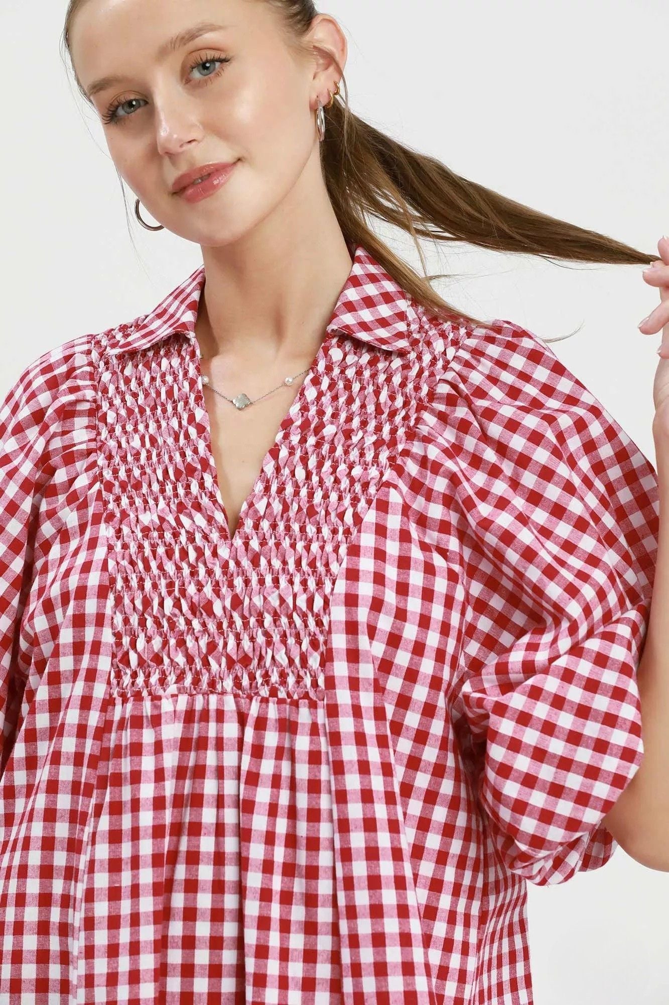 Close detail of smocked bodice on Cherry Check Gingham Midi Dress, AVAH