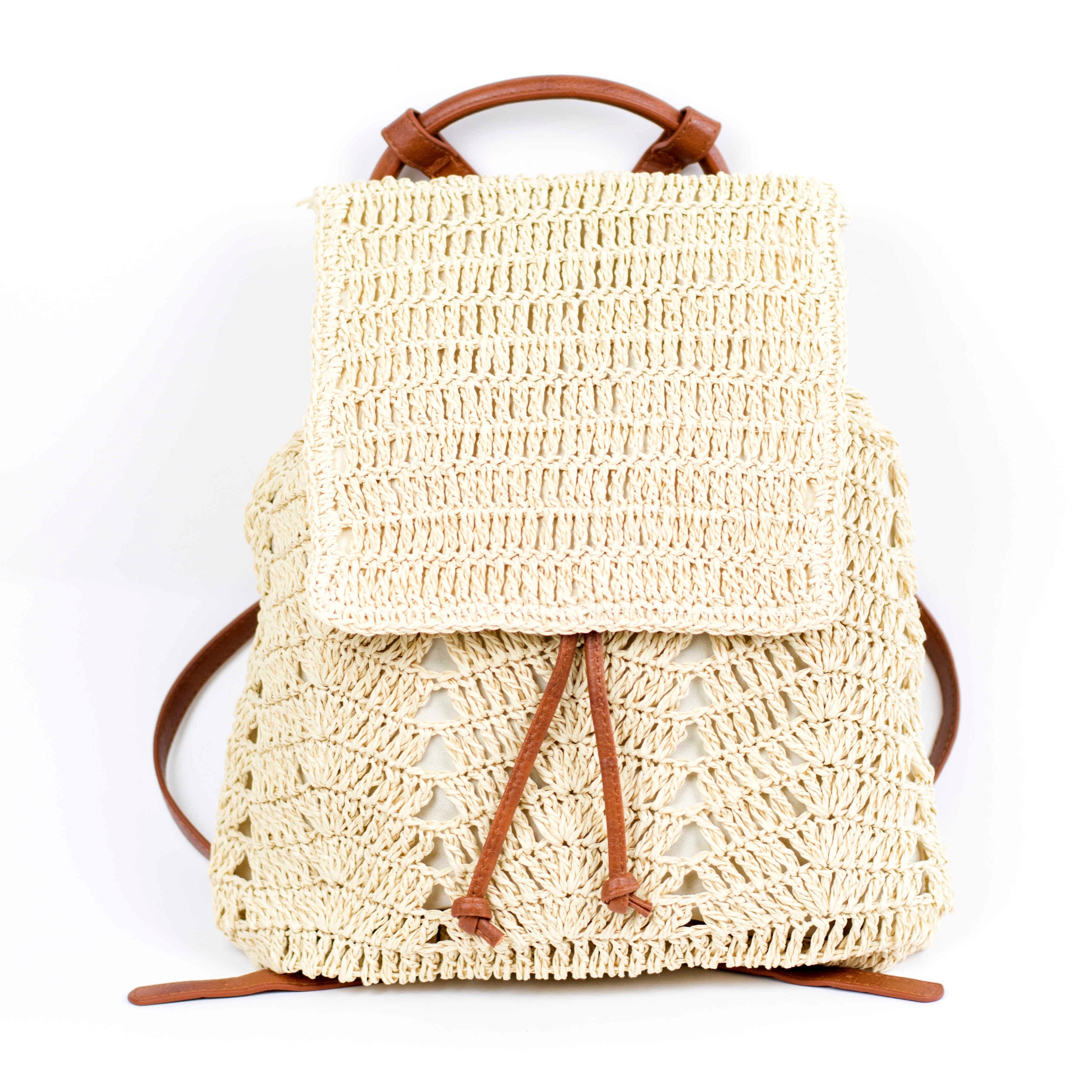 AVAH-front view of cream woven crochet backpack with brown leather straps