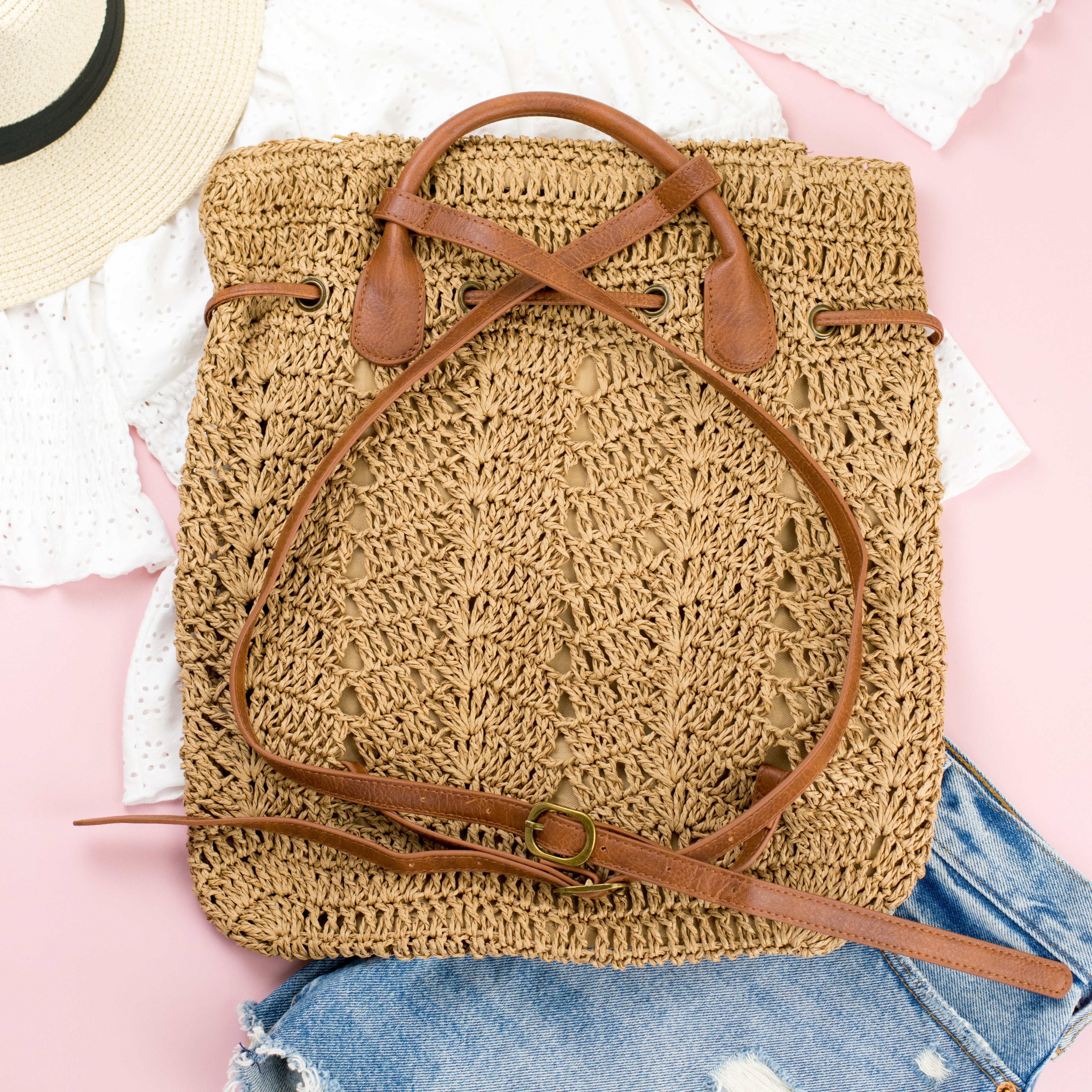 AVAH-back view khaki woven crochet backpack with brown leather straps