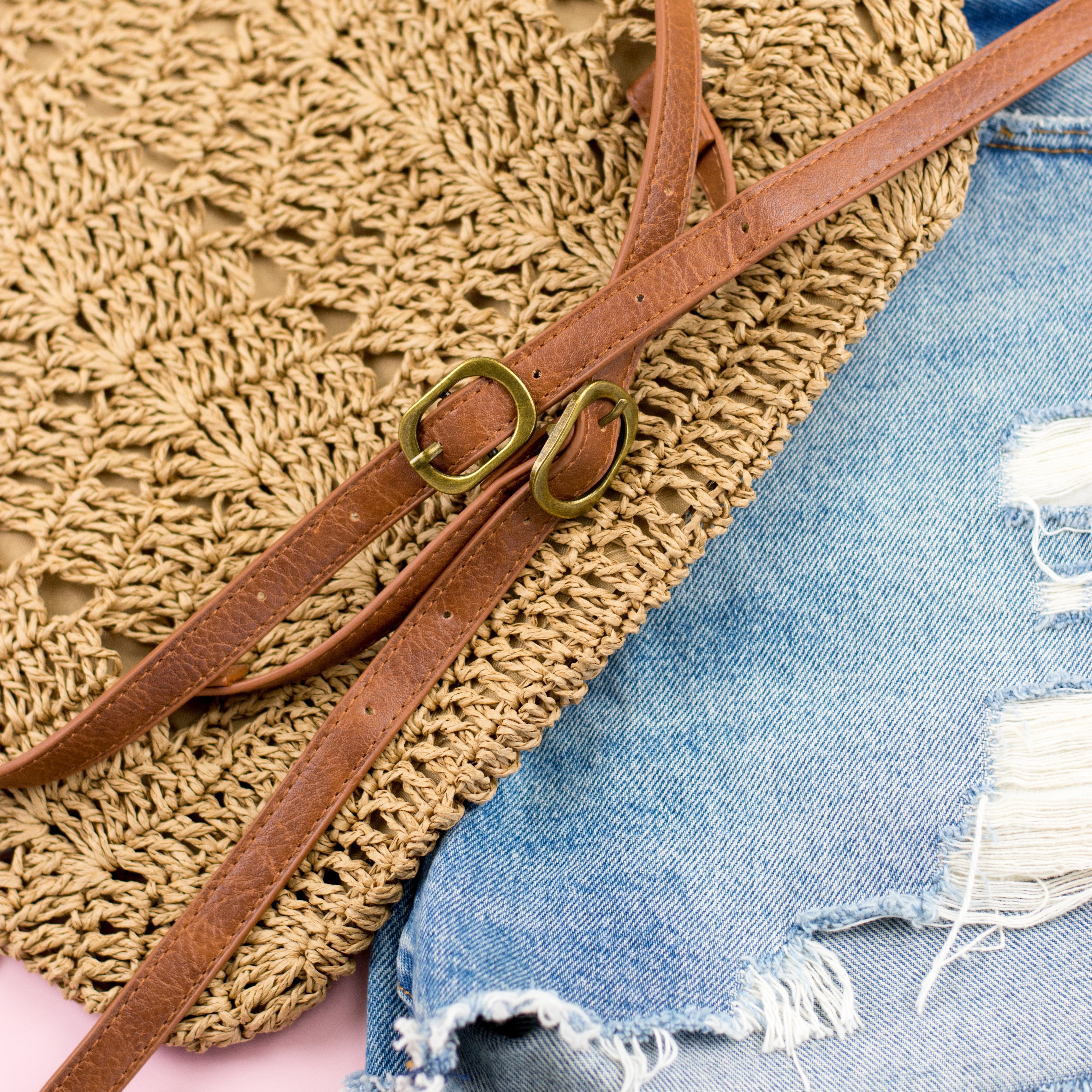 AVAH-bottom view khaki woven crochet backpack with brown leather straps