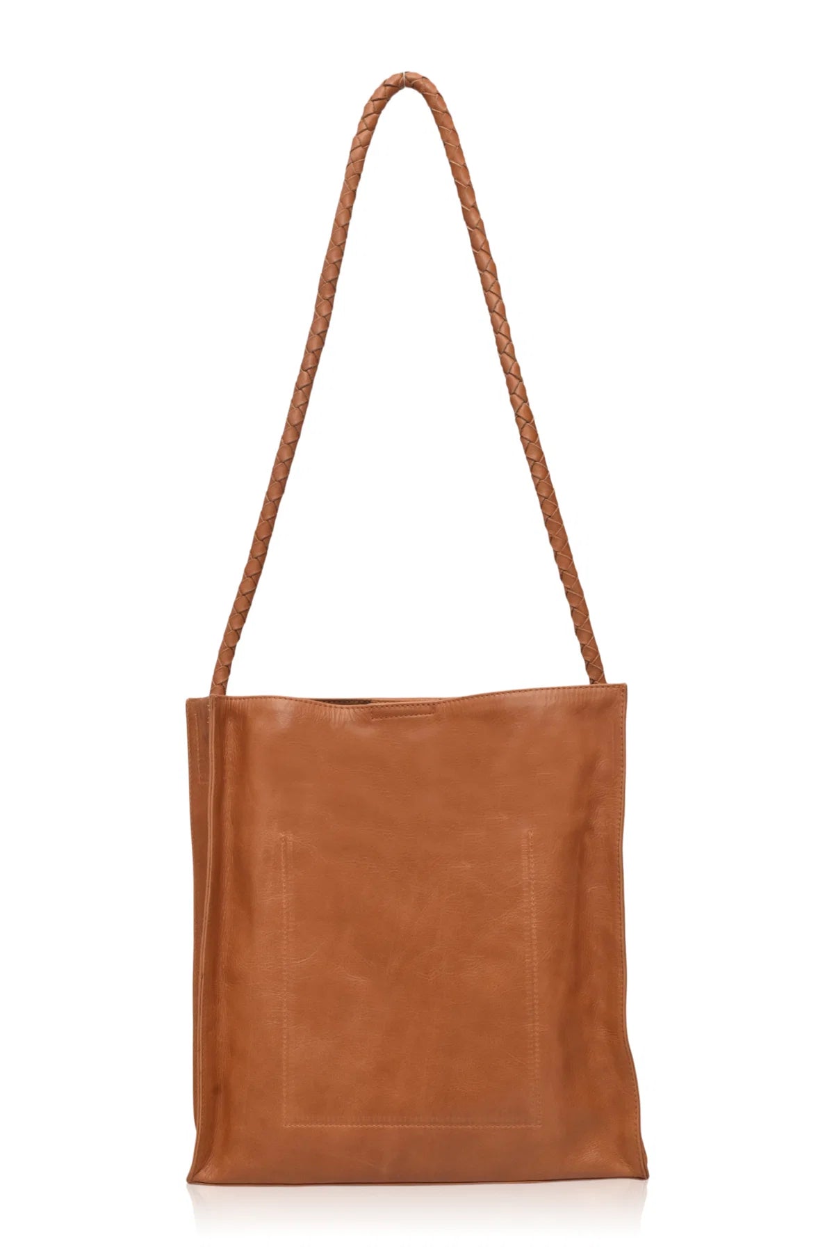 Tan leather tote bag with a rope handle on a white background