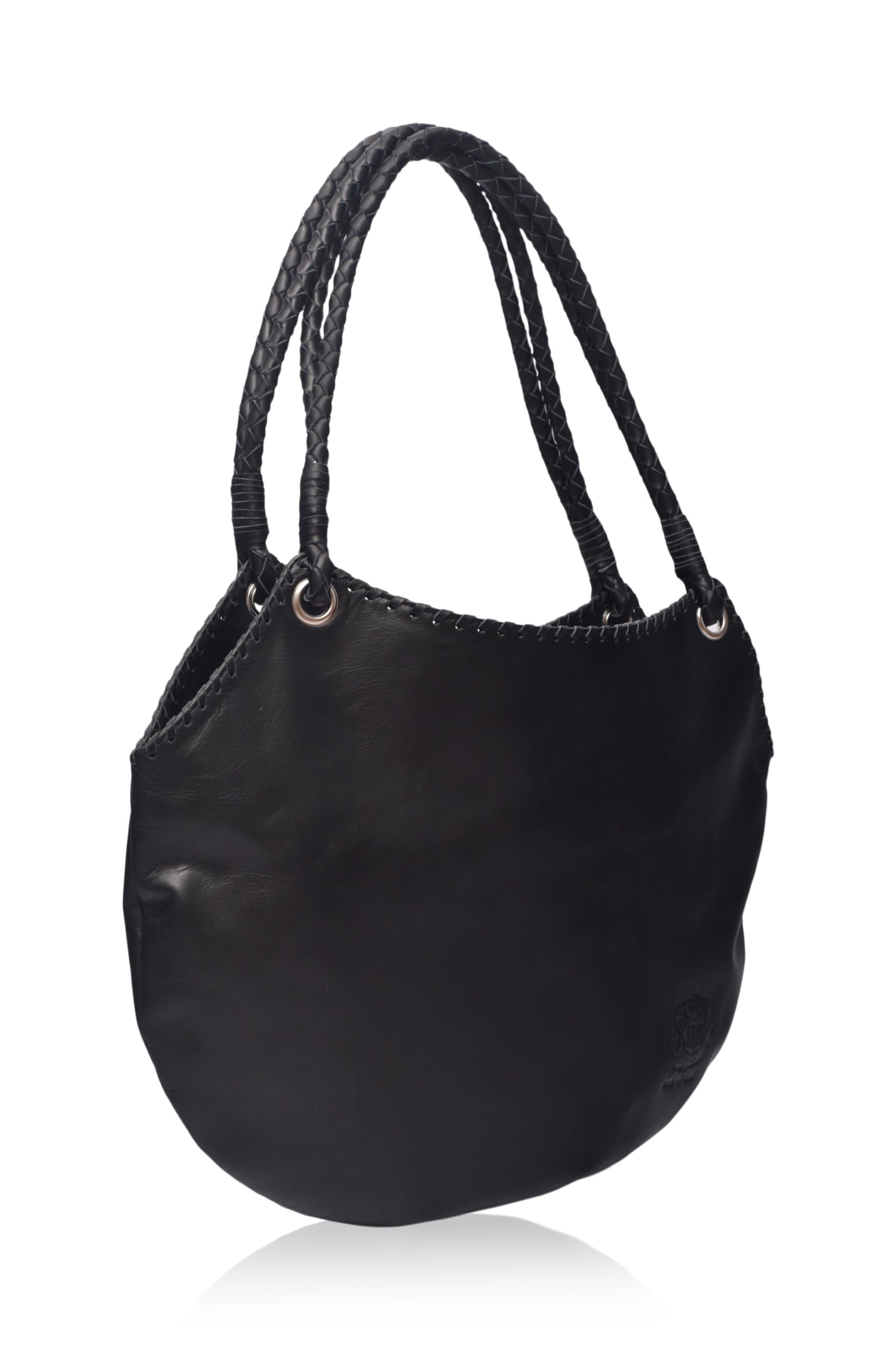 Black leather handbag with braided handle on a white background