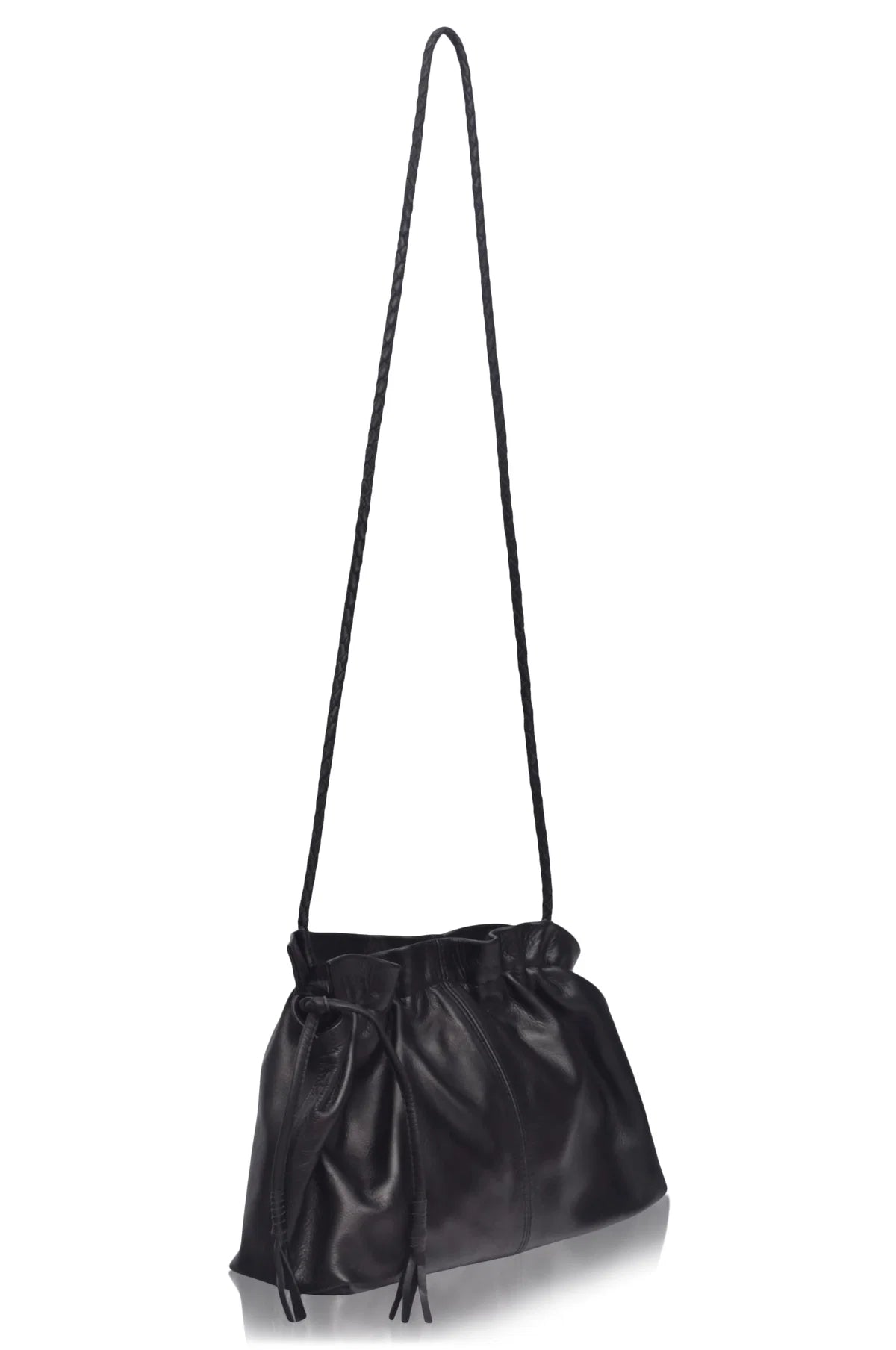Black leather handbag with a long strap on a white background