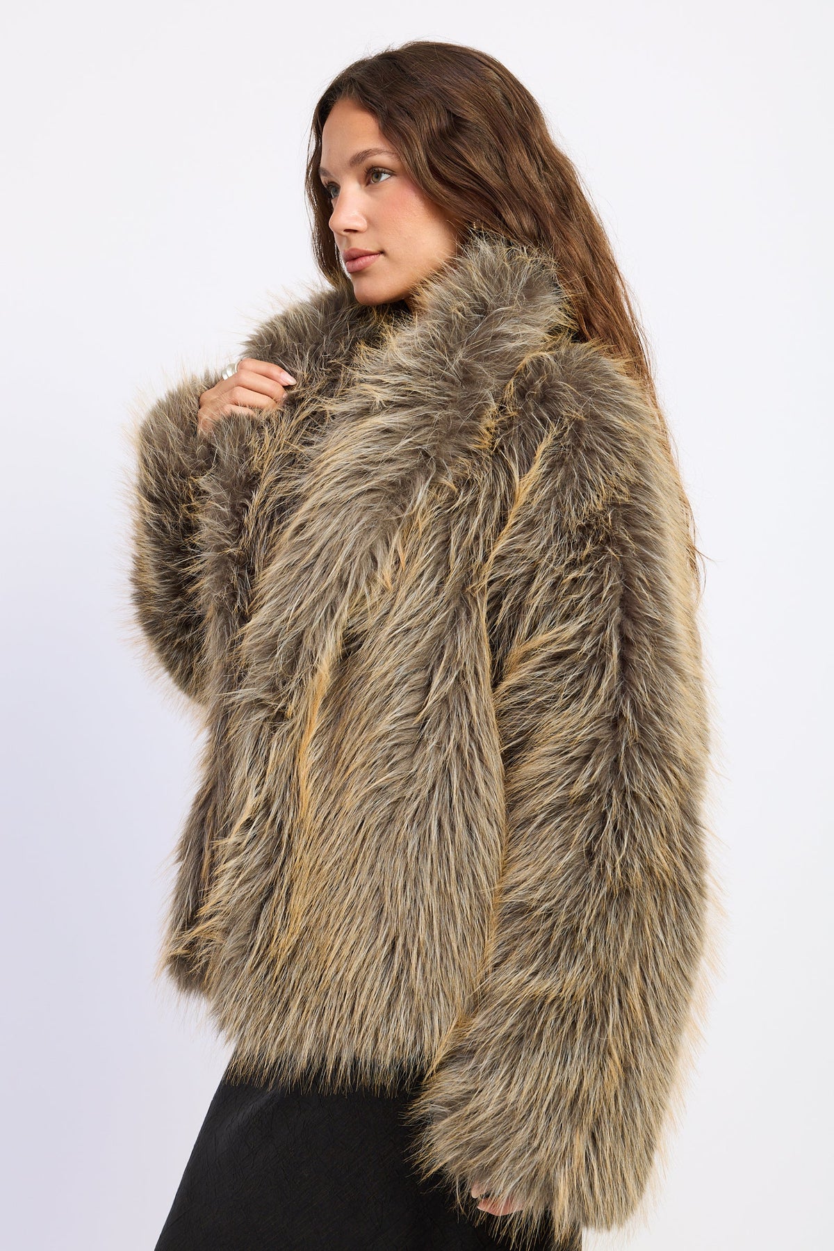 Side view of Montana Wild Faux Fur Coat showing long shaggy faux fur texture and oversized collar.