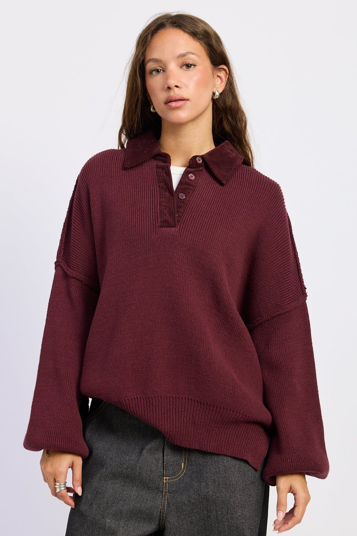 The Weekend Club Collared Knit Sweater in burgundy with ribbed polo collar, button neckline and relaxed oversized fit, front view.