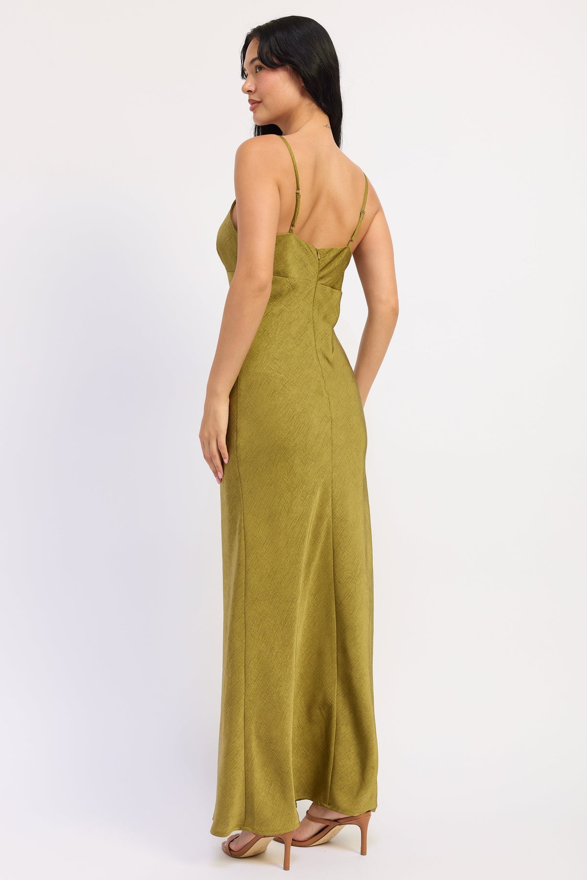 Back view of Sienna Satin Slip Dress in avocado green with adjustable straps and back zipper closure.
