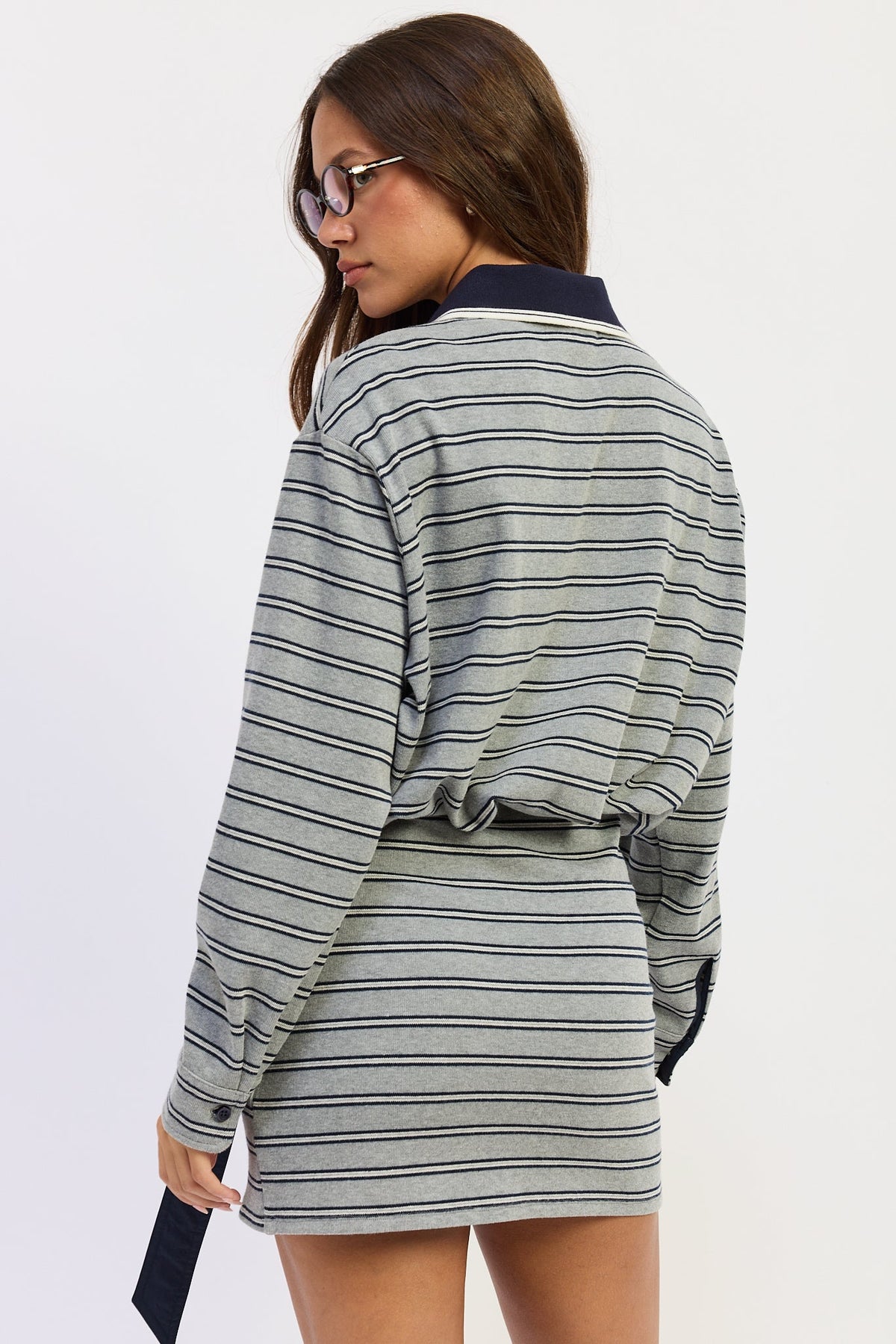 Back view of heather grey Varsity Club Striped Polo Mini Dress featuring navy horizontal stripes, contrasting collar and relaxed upper silhouette.