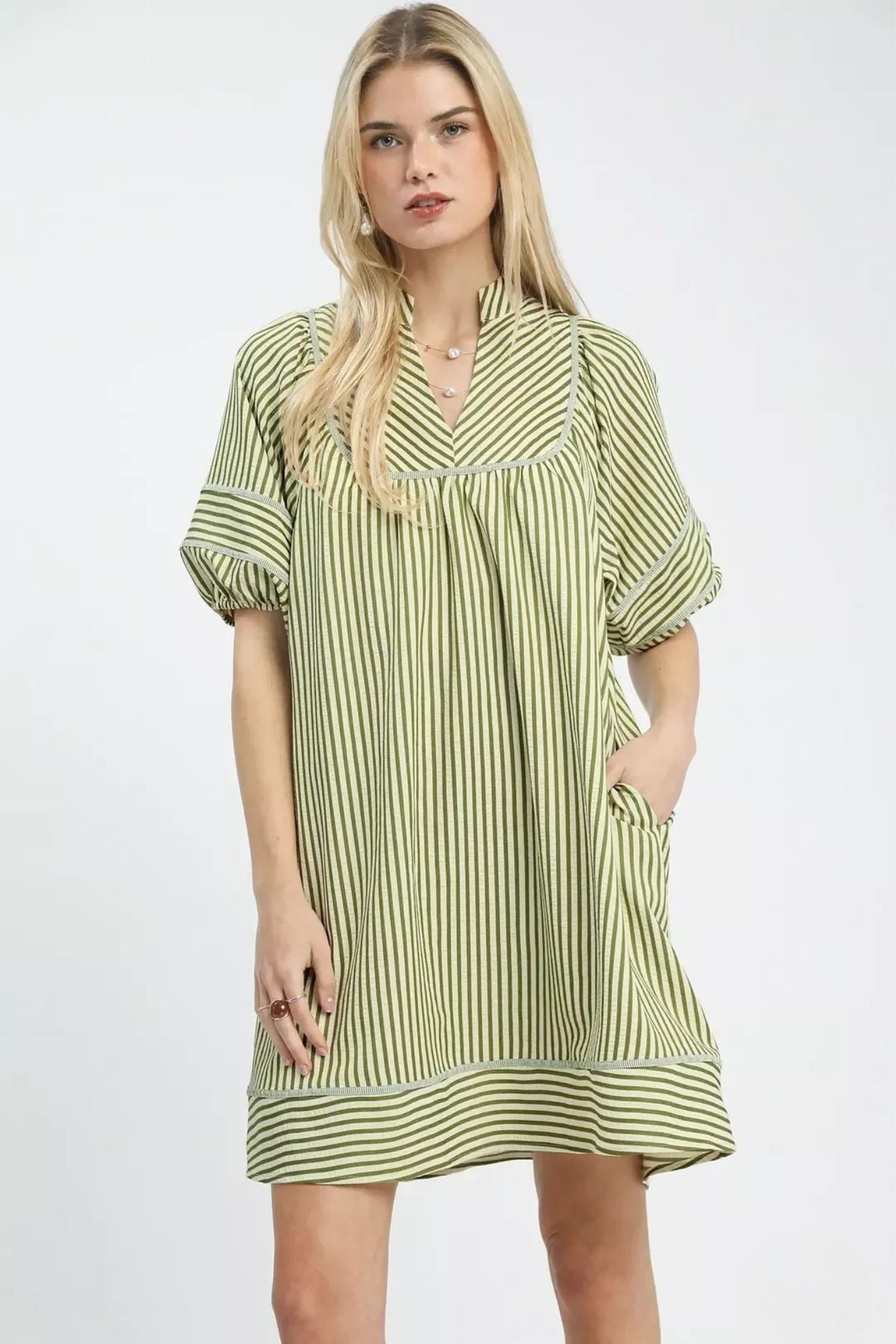 Green stripe V neck mini dress with gathered yoke and puff sleeves front view, AVAH