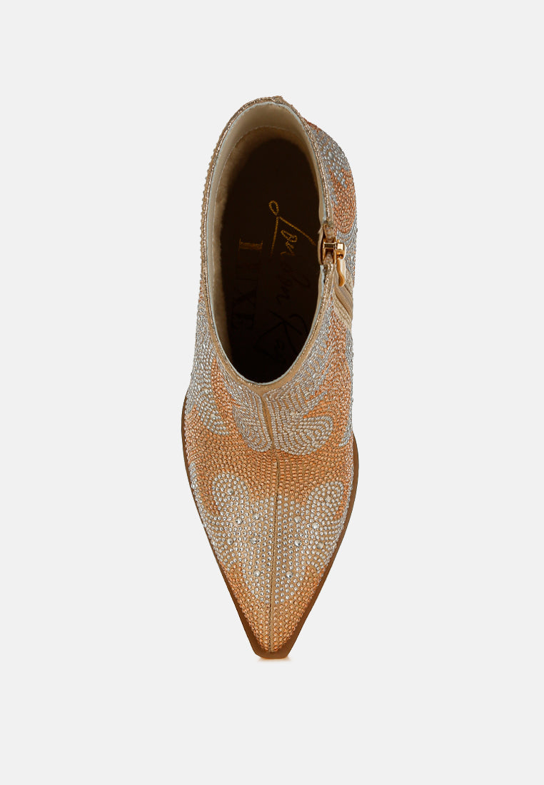 Pointed-toe shoe with intricate design on a light gray background