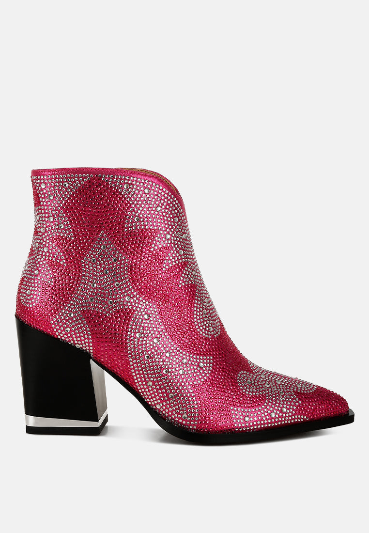 Fuchsia Pink studded ankle boot with a black block heel on a white background