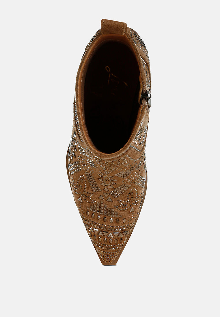 Brown pointed-toe shoe with intricate patterns on a white background