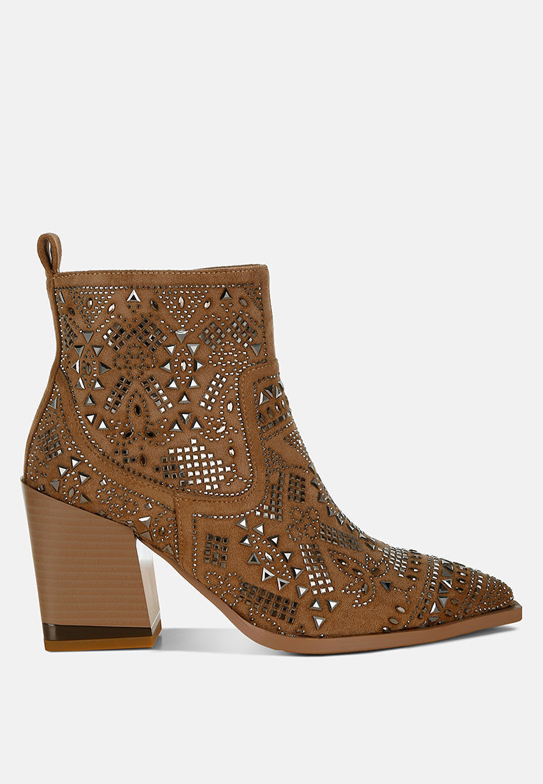 Brown ankle boot with intricate cut-out design on a white background