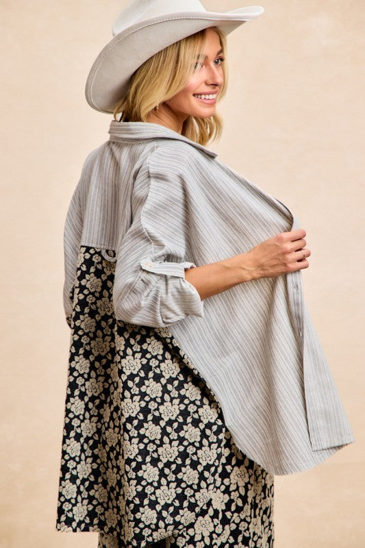 Side and back view of Florence Mixed Print Button Down Shirt showing striped upper panel and contrasting floral lower section.