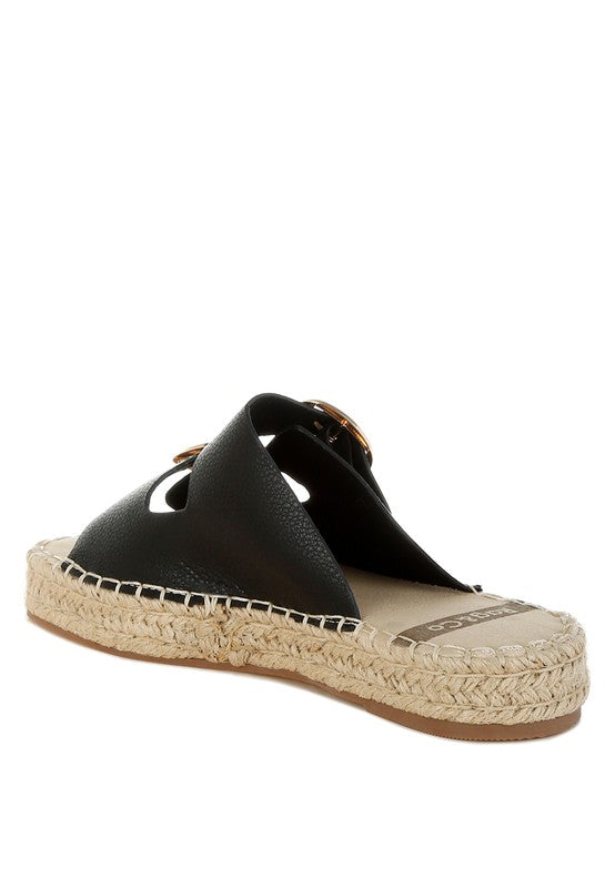 Back angled view of black flatform espadrille sandal showing leather straps and cushioned footbed