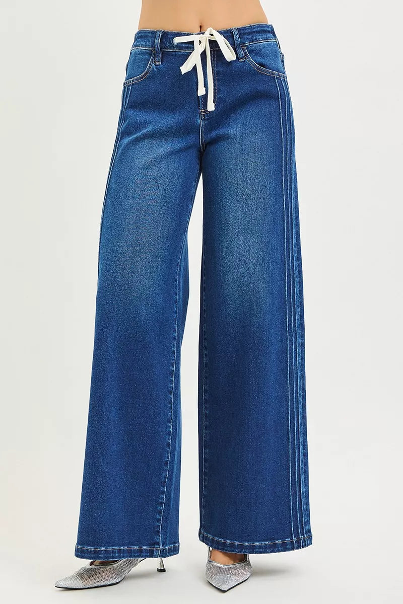 Front view of wide leg drawstring jeans with raised seam detail in indigo wash, AVAH