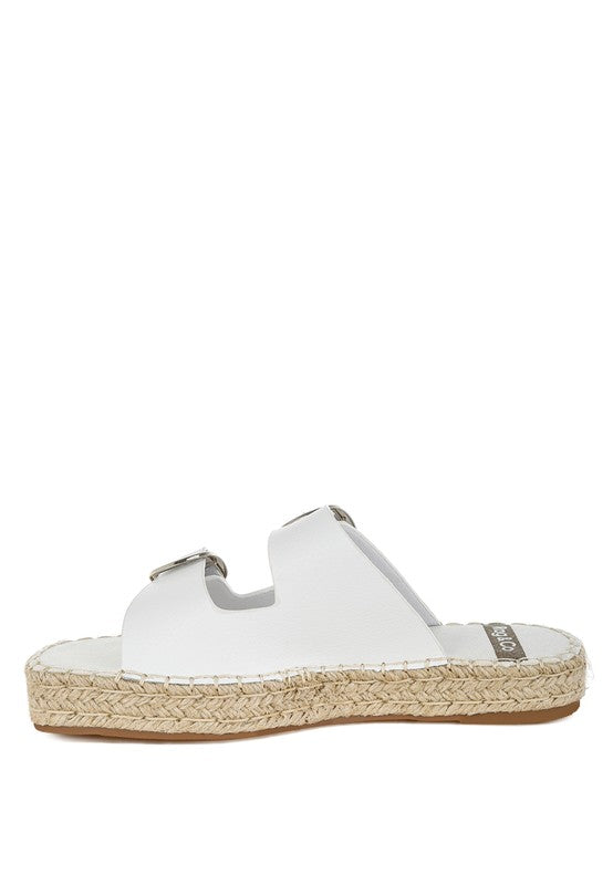 Side view of white leather slip-on espadrille sandal with double adjustable buckle straps