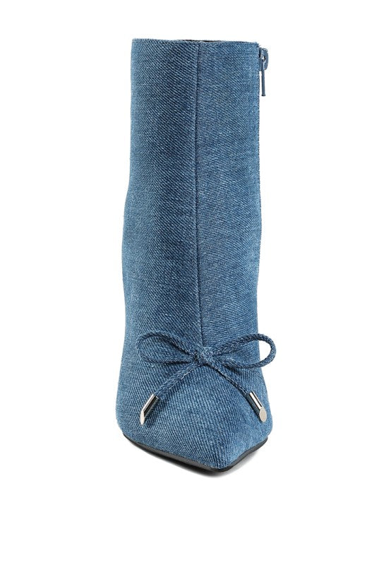 front view of denim ankle boot with centered bow tie detail