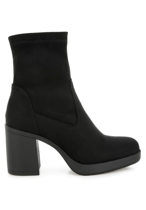 Black platform block heel boot, profile view.