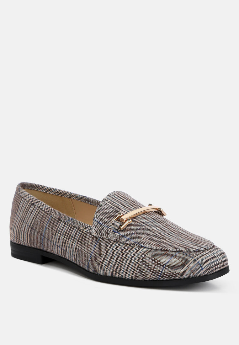 Plaid loafers with a gold buckle on a white background