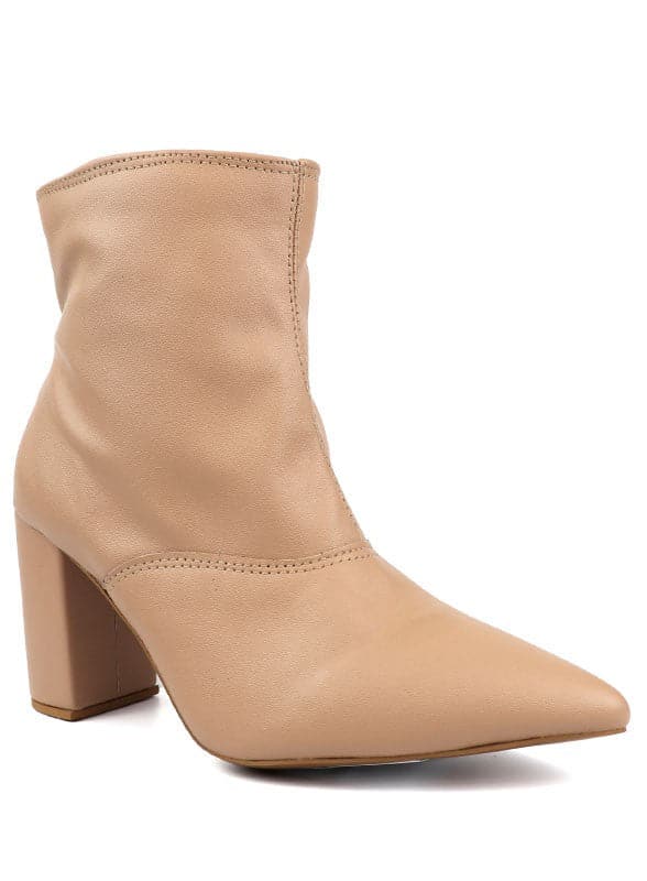 This pointed toe bootie is a chic and comfortable must have for fall. With its side zip closure, pointy toe and block heel this pair is ideal for your everyday needs. Pair it with your favorite look while the weather turns chilly! Avah Couture