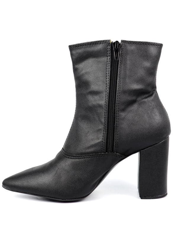 This pointed toe bootie is a chic and comfortable must have for fall. With its side zip closure, pointy toe and block heel this pair is ideal for your everyday needs. Pair it with your favorite look while the weather turns chilly! Avah Couture