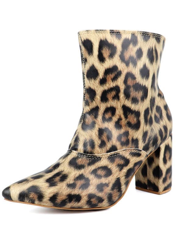 This pointed toe bootie is a chic and comfortable must have for fall. With its side zip closure, pointy toe and block heel this pair is ideal for your everyday needs. Pair it with your favorite look while the weather turns chilly! Avah Couture