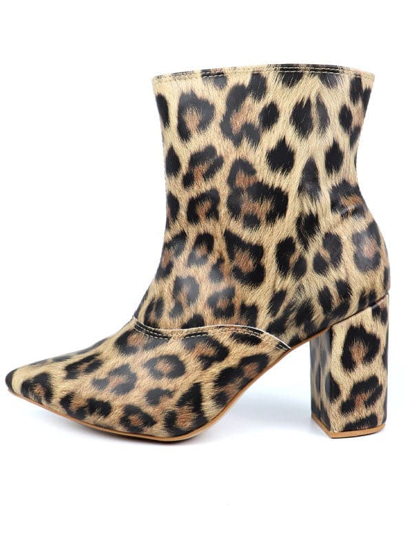 This pointed toe bootie is a chic and comfortable must have for fall. With its side zip closure, pointy toe and block heel this pair is ideal for your everyday needs. Pair it with your favorite look while the weather turns chilly! Avah Couture