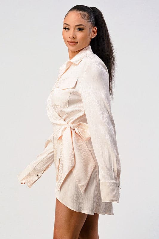 A long sleeve wrap shirt dress with double pockets. The versatile and chic piece is perfect for every occasion. Wear it with trousers for a conservative look or as a dress for more of an edgy vibe. However styled, you will love it! Leopard print Shirt dress Collared Long sleeves with cuff Wrap front Double pocket - Avah Couture