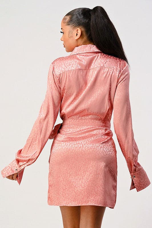 A long sleeve wrap shirt dress with double pockets. The versatile and chic piece is perfect for every occasion. Wear it with trousers for a conservative look or as a dress for more of an edgy vibe. However styled, you will love it! Leopard print Shirt dress Collared Long sleeves with cuff Wrap front Double pocket - Avah Couture