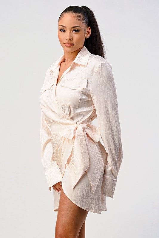 A long sleeve wrap shirt dress with double pockets. The versatile and chic piece is perfect for every occasion. Wear it with trousers for a conservative look or as a dress for more of an edgy vibe. However styled, you will love it! Leopard print Shirt dress Collared Long sleeves with cuff Wrap front Double pocket - Avah Couture