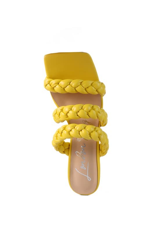 The high bae pointed heel braided sandals are a great choice for your next adventure. These square toed sandals feature 3 rich faux leather braided straps on the mid rise heel, making them comfortable and trendy. With delightful color options to choose from, you can take these beauties anywhere! Avah Couture