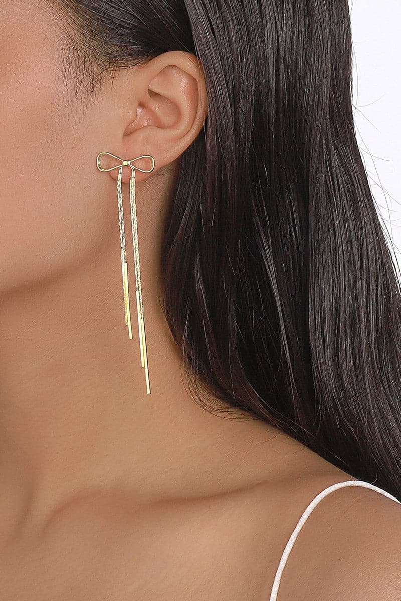 These bow drop earrings are the perfect finishing touch to any outfit. Long and dangly, these geometric beauties add the perfect amount of femininity while still maintaining a modern feel. Avah Couture