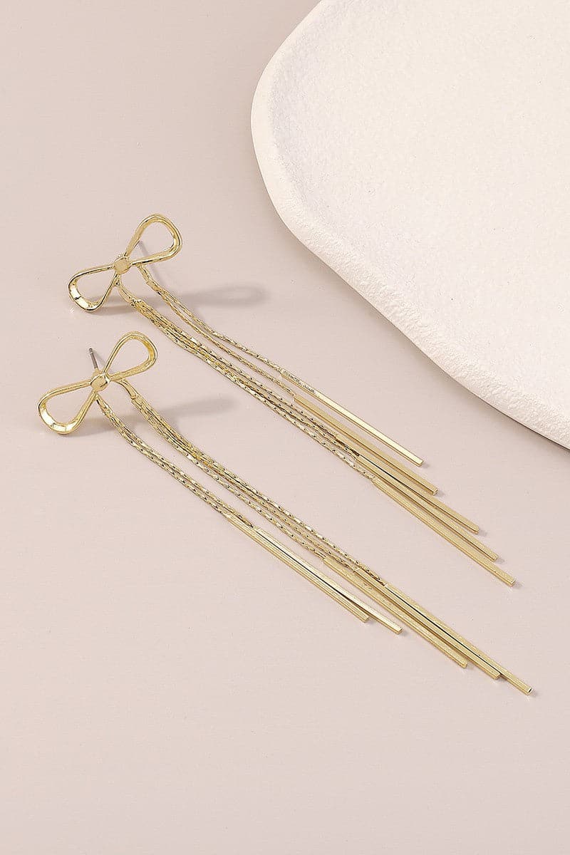 These bow drop earrings are the perfect finishing touch to any outfit. Long and dangly, these geometric beauties add the perfect amount of femininity while still maintaining a modern feel. Avah Couture