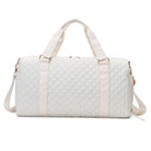 AVAH-Weekend Bliss Quilted Travel Bag in Bisque featuring a timeless design with vegan leather accents, Exterior open side pocket, luggage/trolley sleeve, shoe compartment, zip pocket and gold hardware