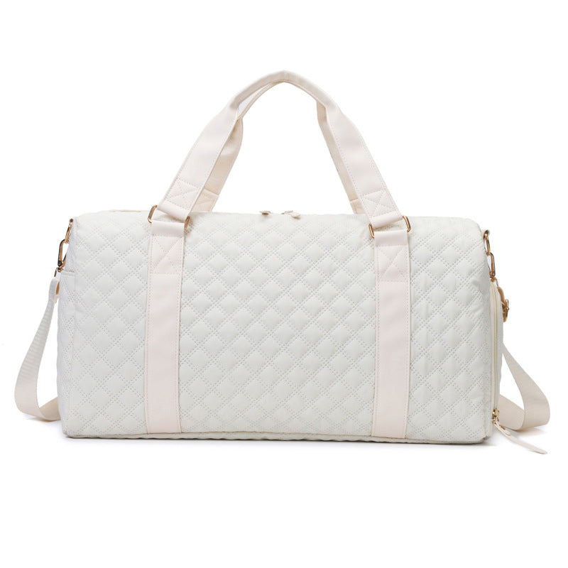 AVAH-Weekend Bliss Quilted Travel Bag in Bisque featuring a timeless design with vegan leather accents, Exterior open side pocket, luggage/trolley sleeve, shoe compartment, zip pocket and gold hardware