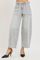 Front view of grey barrel leg jeans with patch pockets and contrast stitching, AVAH