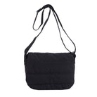 Black shoulder bag with a strap on a white background