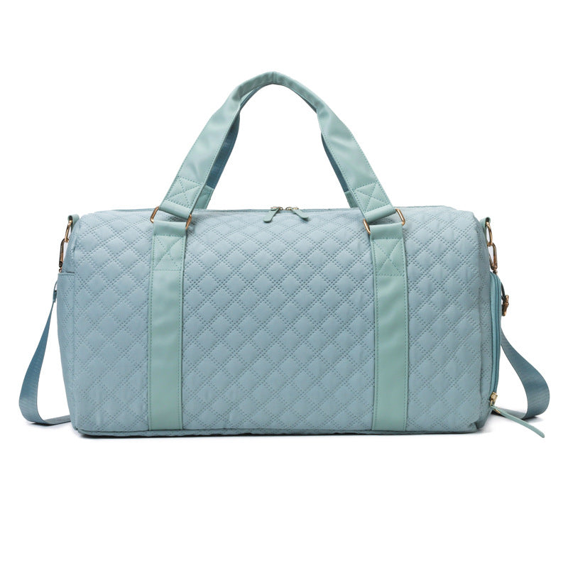AVAH-Weekend Bliss Quilted Travel Bag in blue featuring a timeless design with vegan leather accents, Exterior open side pocket, luggage/trolley sleeve, shoe compartment, zip pocket and gold hardware