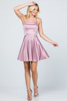 Mauve skater dress with thin straps and satin finish front view
