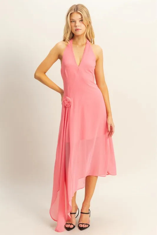 Pink chiffon asymmetrical midi dress with halter neckline, rosette detail and draped side hem
