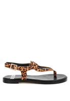 Side view showcasing microfiber strap and thong silhouette