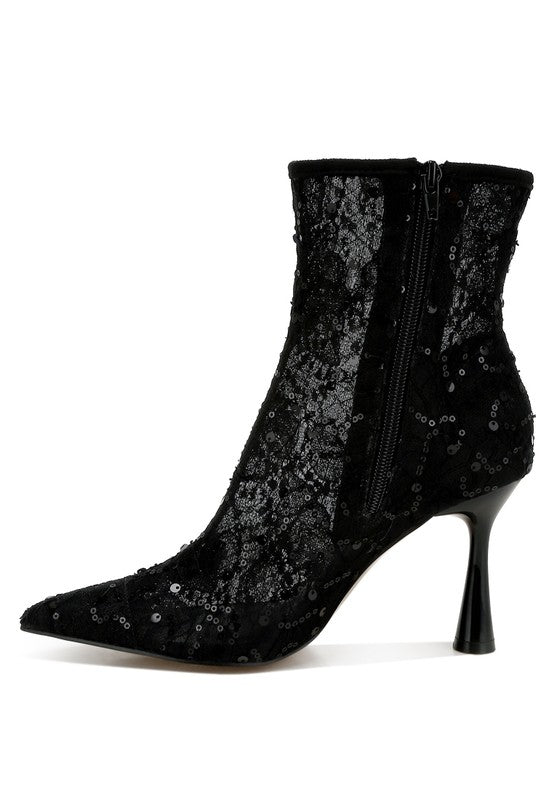 Side view of black lace ankle boot with zipper closure
