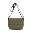 Green shoulder bag on a white background