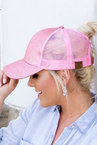 Pink glitter high ponytail cap side view