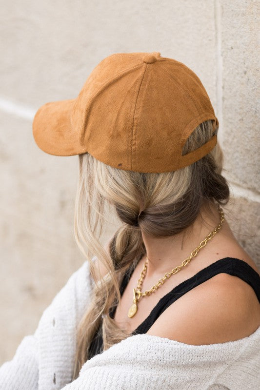 Back view of camel cap showing adjustable clasp
