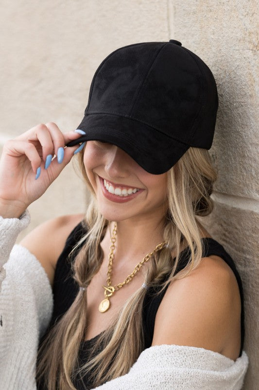 Model wearing black vegan suede baseball cap, front view-AVAH