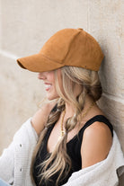 Model wearing camel vegan suede baseball cap, side view-AVAH
